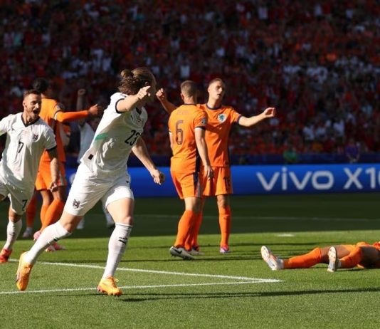 Áo thổi bay "Cơn Lốc Màu Da Cam"